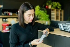 Woman Choosing Quartz Materials For Countertops In Utc