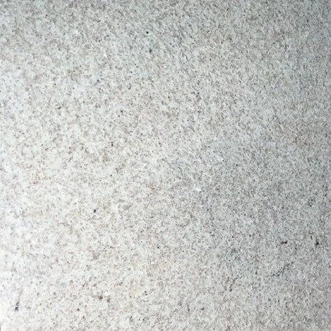 Grey textured concrete surface close-up.