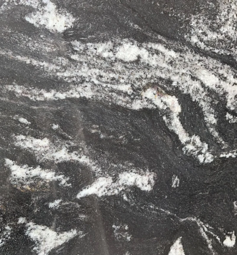 Black granite texture with white veins.