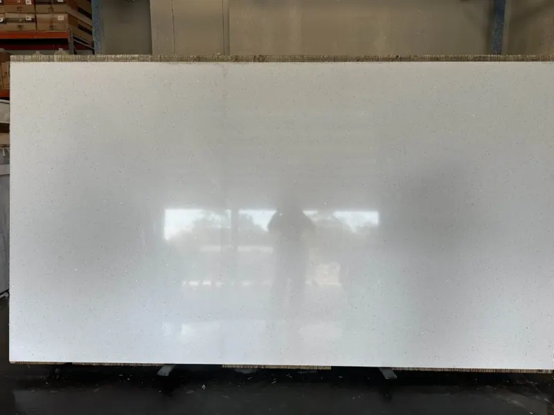 Large white stone slab in a warehouse.