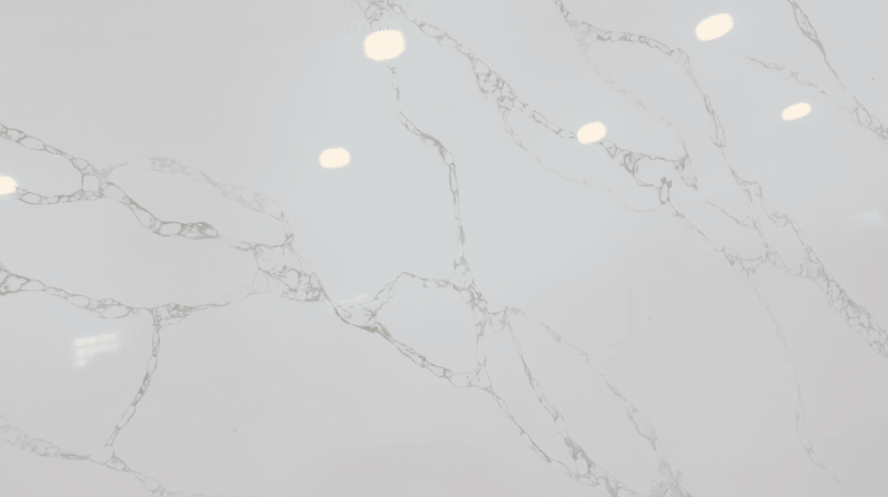 White marble surface with gray veins.