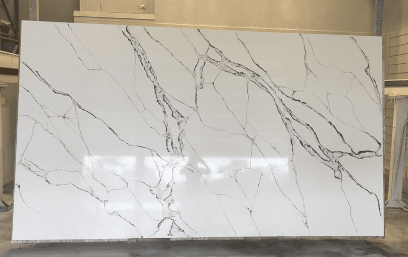 Large white marble slab with dark veins