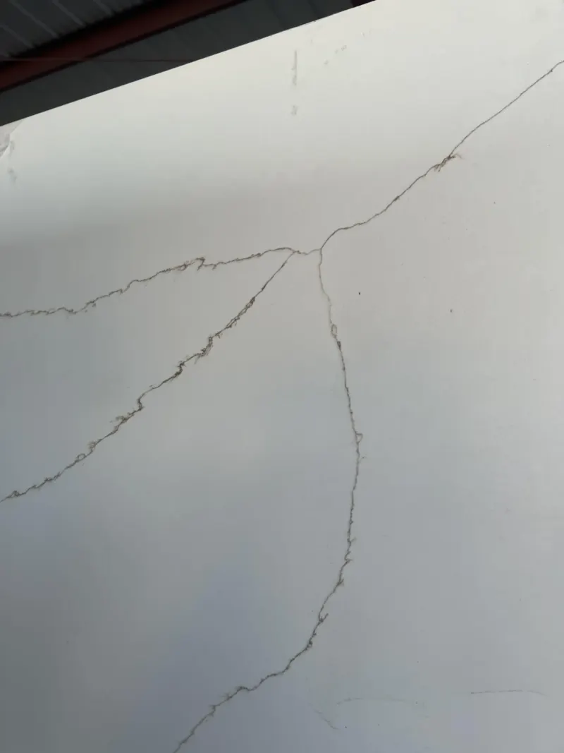 Close-up of cracked white surface