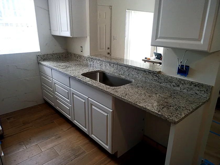 Dallas White Granite countertop kitchen — Edstone Orlando installation