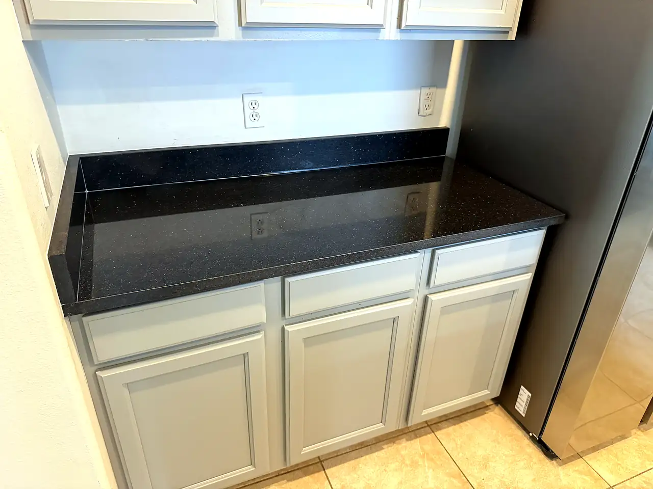 Black Galaxy Granite countertop kitchen — Edstone Orlando installation