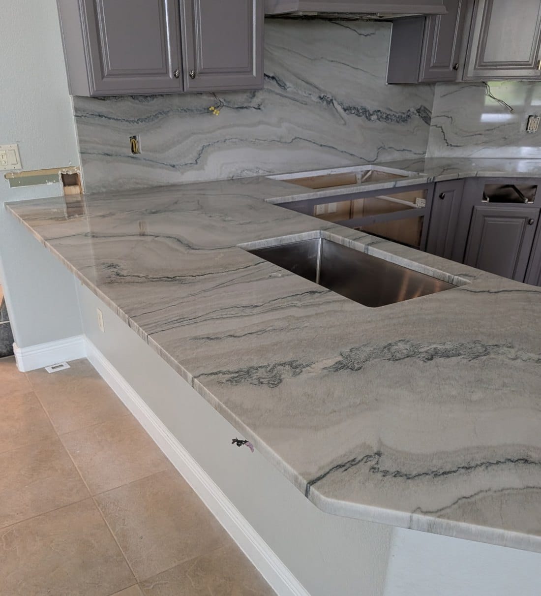 Custom quartzite countertop by EdStone in Clermont, Central Florida